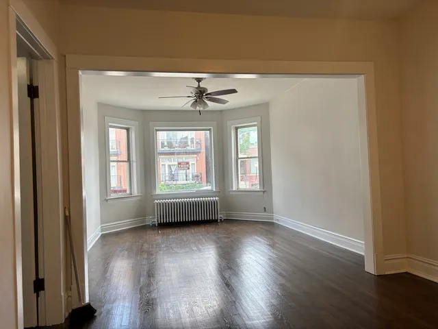 a view of livingroom with hardwood floor and window