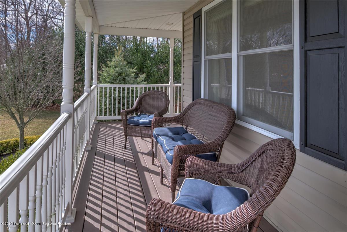 130 Crine Road Morganville, NJ 07751 - Photo 4 of 46 a balcony view with a seating space