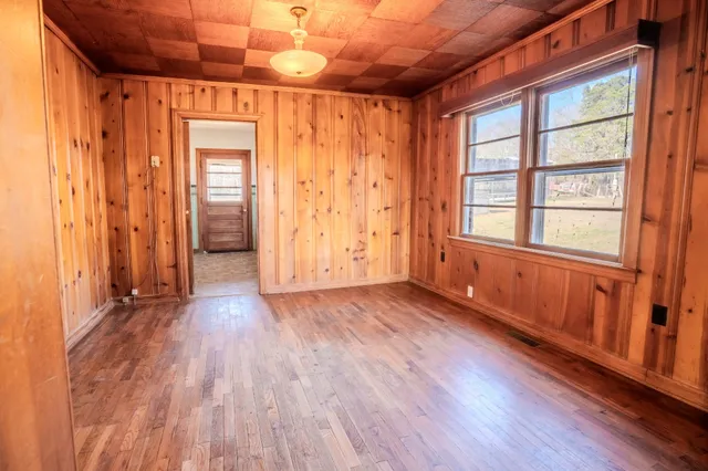 a kitchen with stainless steel appliances granite countertop a sink and cabinets