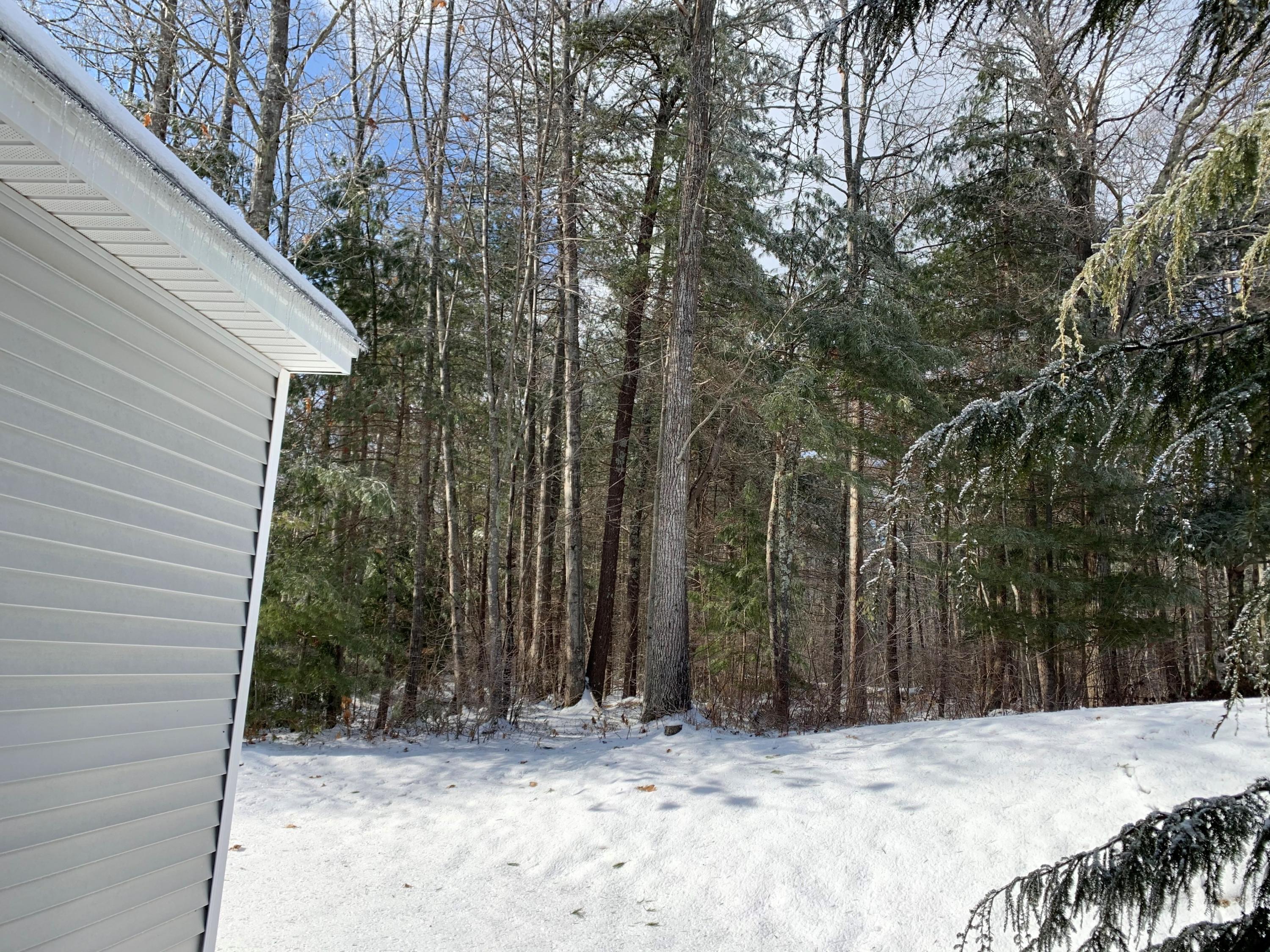 149 Spinnaker Ridge Drive, Unit 45 Wells, ME 04090 - Photo 3 of 27 Evergreens offer lovely privacy.