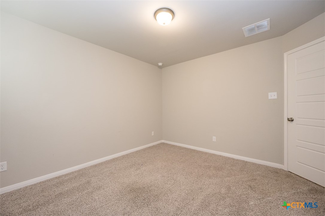 113 Lazy Lizzy Road Jarrell, TX 76537 - Photo 23 of 29 a view of an empty room