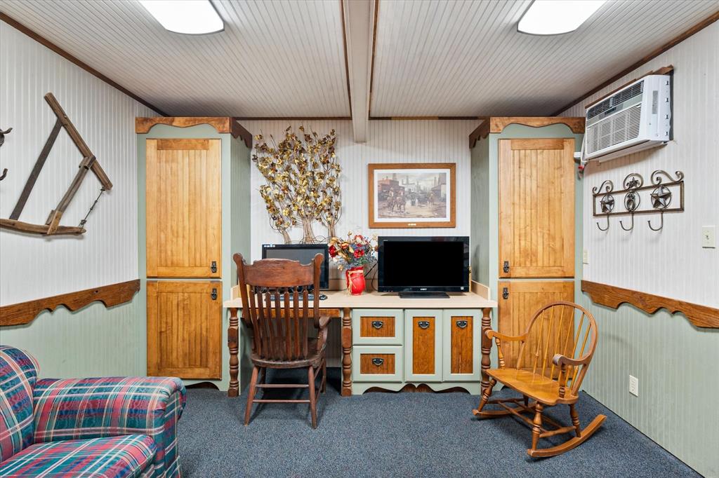 1209 Southwest County Road Corsicana, TX 75109 - Photo 13 of 27 a living room with furniture and a flat screen tv
