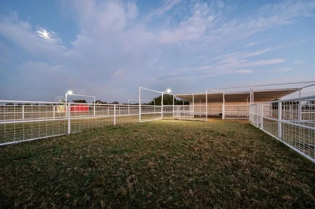 a view of outdoor space with deck and yard
