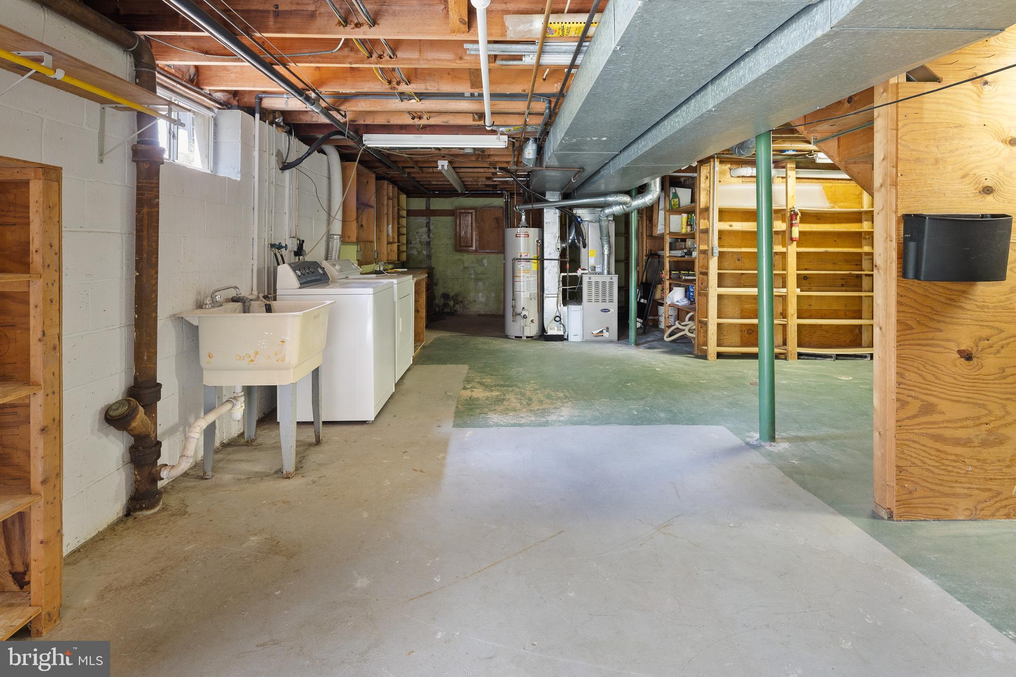 5014 Round Tower Place Columbia, MD 21044 - Photo 28 of 47 Unfinished basement with laundry