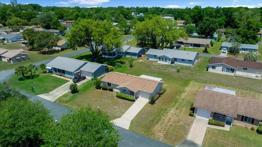 8445 Southwest 109th Street Ocala, FL 34481 - Photo 24 of 32 an aerial view of a house with garden space and street view