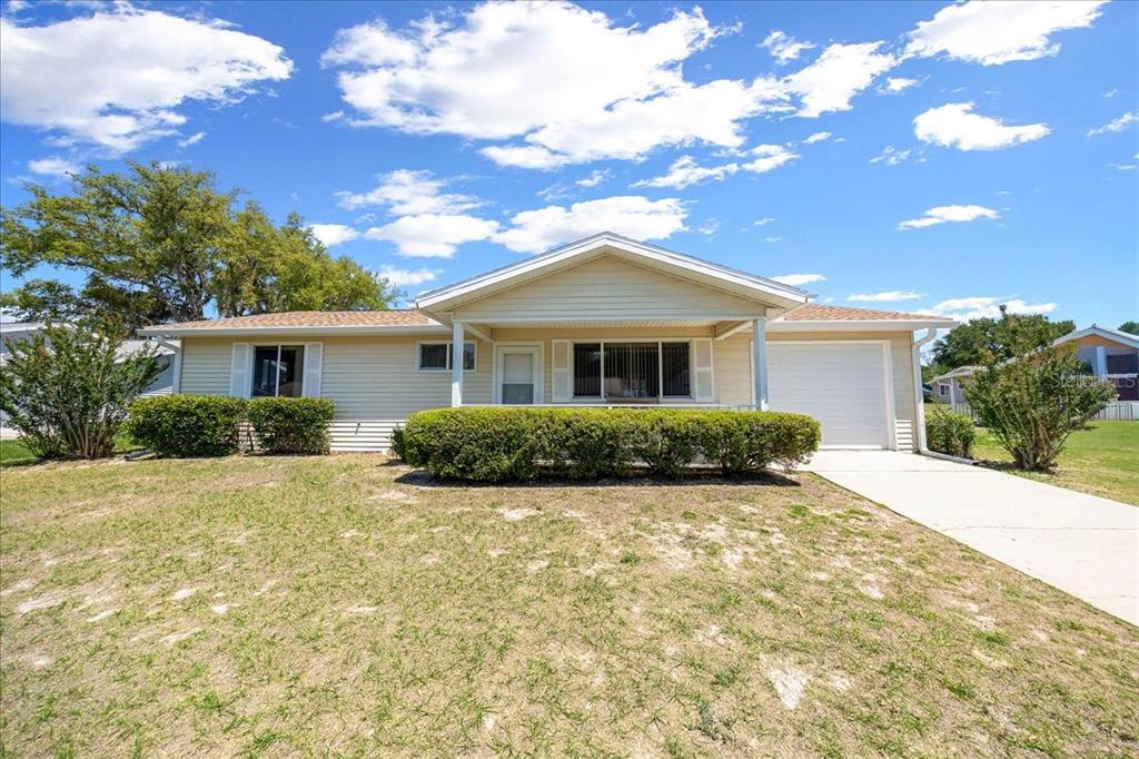 8445 Southwest 109th Street Ocala, FL 34481 - Photo 32 of 32 a view of a house with a patio