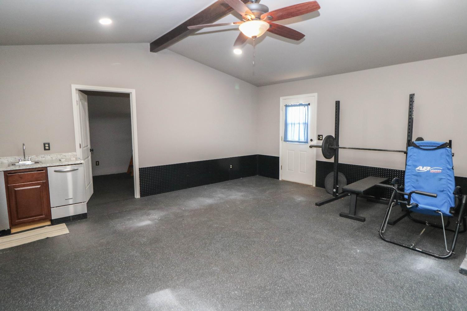 561 Farm To Market Road 302 Springlake, TX 79082 - Photo 22 of 38 a view of a livingroom with furniture and a ceiling fan