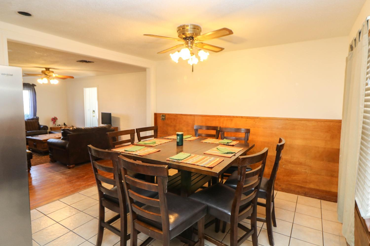 561 Farm To Market Road 302 Springlake, TX 79082 - Photo 9 of 38 a view of a dining table and chairs in the patio