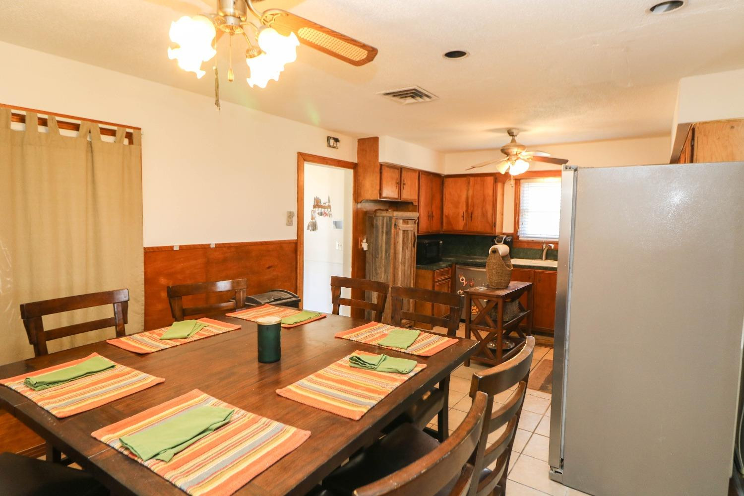 561 Farm To Market Road 302 Springlake, TX 79082 - Photo 10 of 38 a view of a dining room with furniture