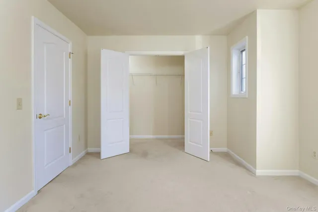 an empty room with closet