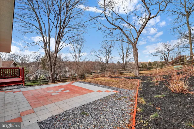 a view of pathway with a yard