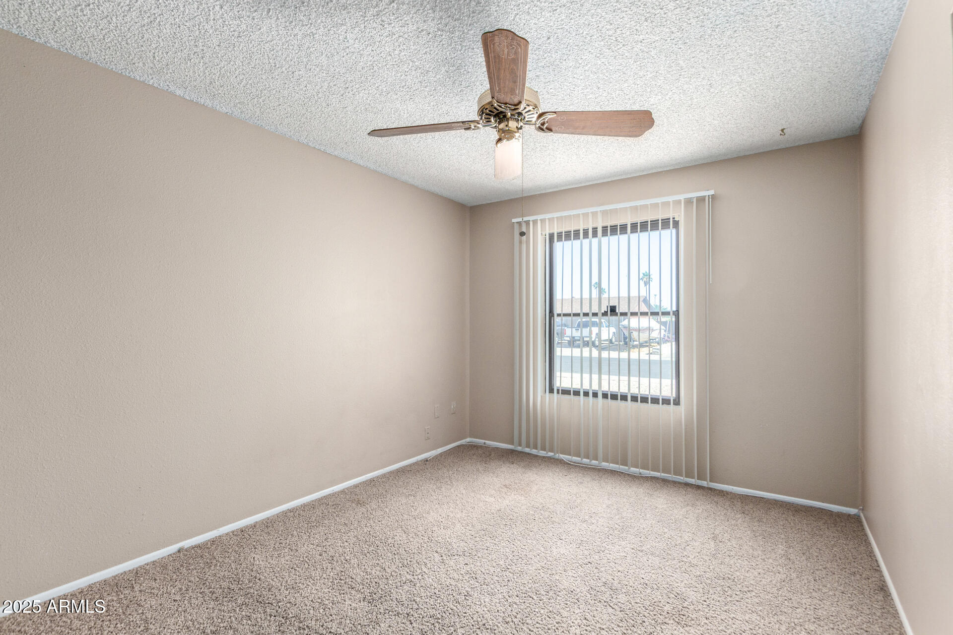 4740 West Bloomfield Road Glendale, AZ 85304 - Photo 24 of 34 a view of an empty room with a window