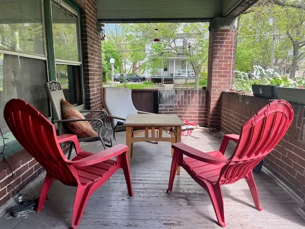 a view of a dining room with furniture window and outside view