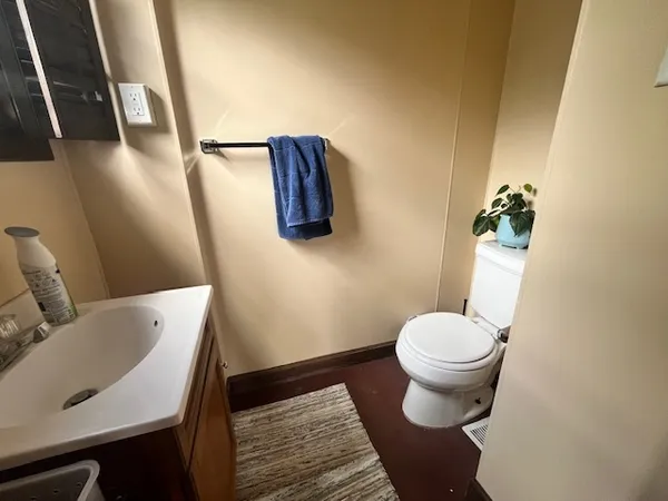 a bathroom with a sink and a toilet