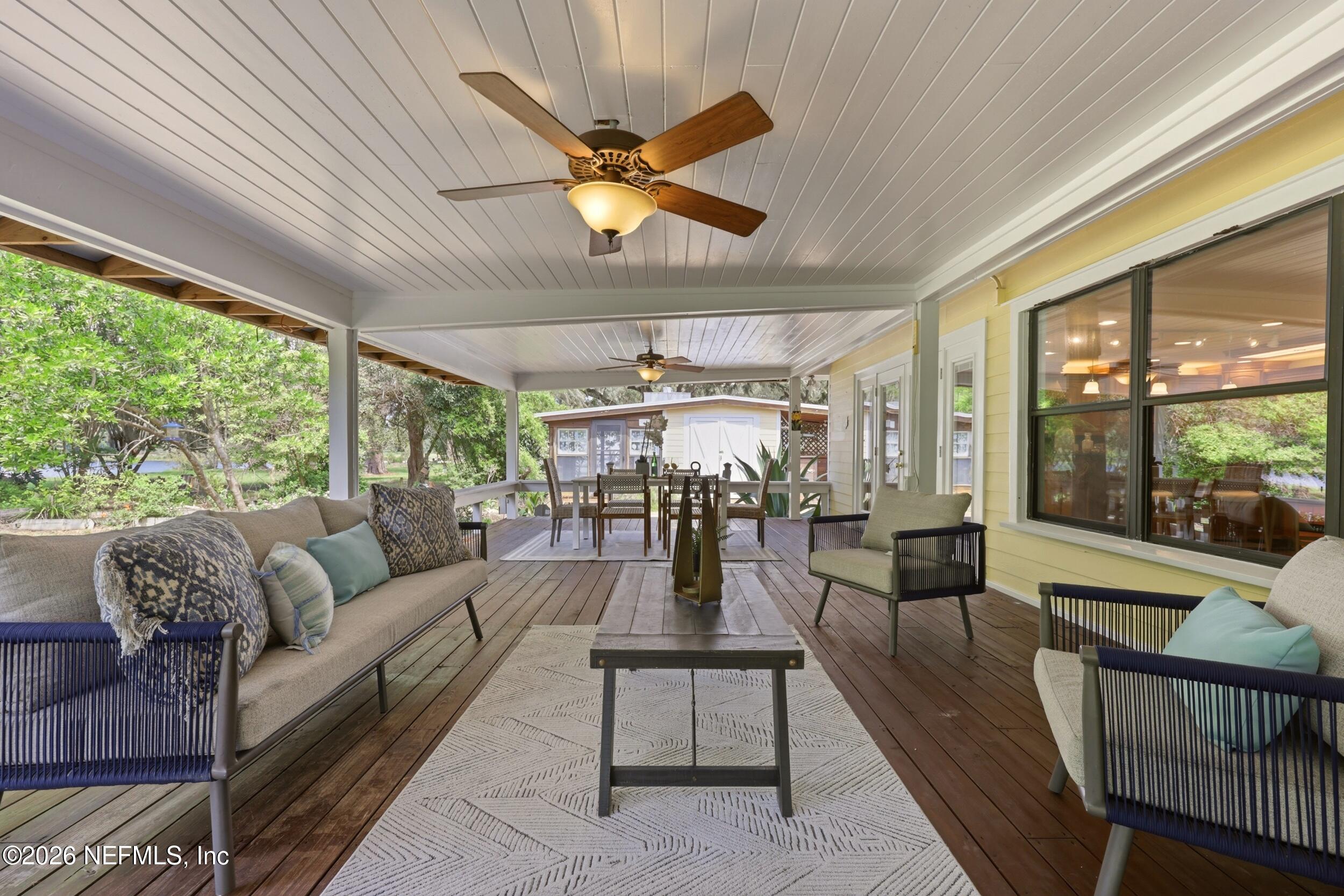 7932 Breezy Point Road West Melrose, FL 32666 - Photo 51 of 84 Covered Deck
