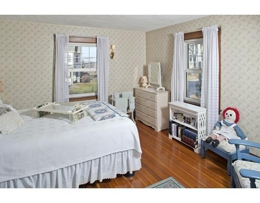 8 Winthrop Avenue Hull, MA 02045 - Photo 7 of 17 a bedroom with a bed and wooden floor