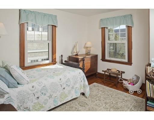 8 Winthrop Avenue Hull, MA 02045 - Photo 8 of 17 a bedroom with a bed and wooden floor