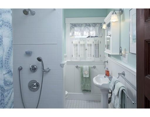 8 Winthrop Avenue Hull, MA 02045 - Photo 10 of 17 a bathroom with a sink mirror and shower