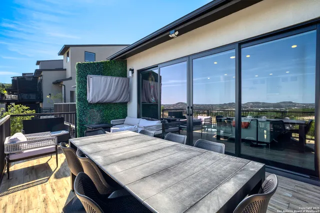 a bathroom with a toilet a sink and a mirror