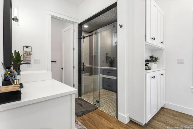 a kitchen with stainless steel appliances a stove and a refrigerator