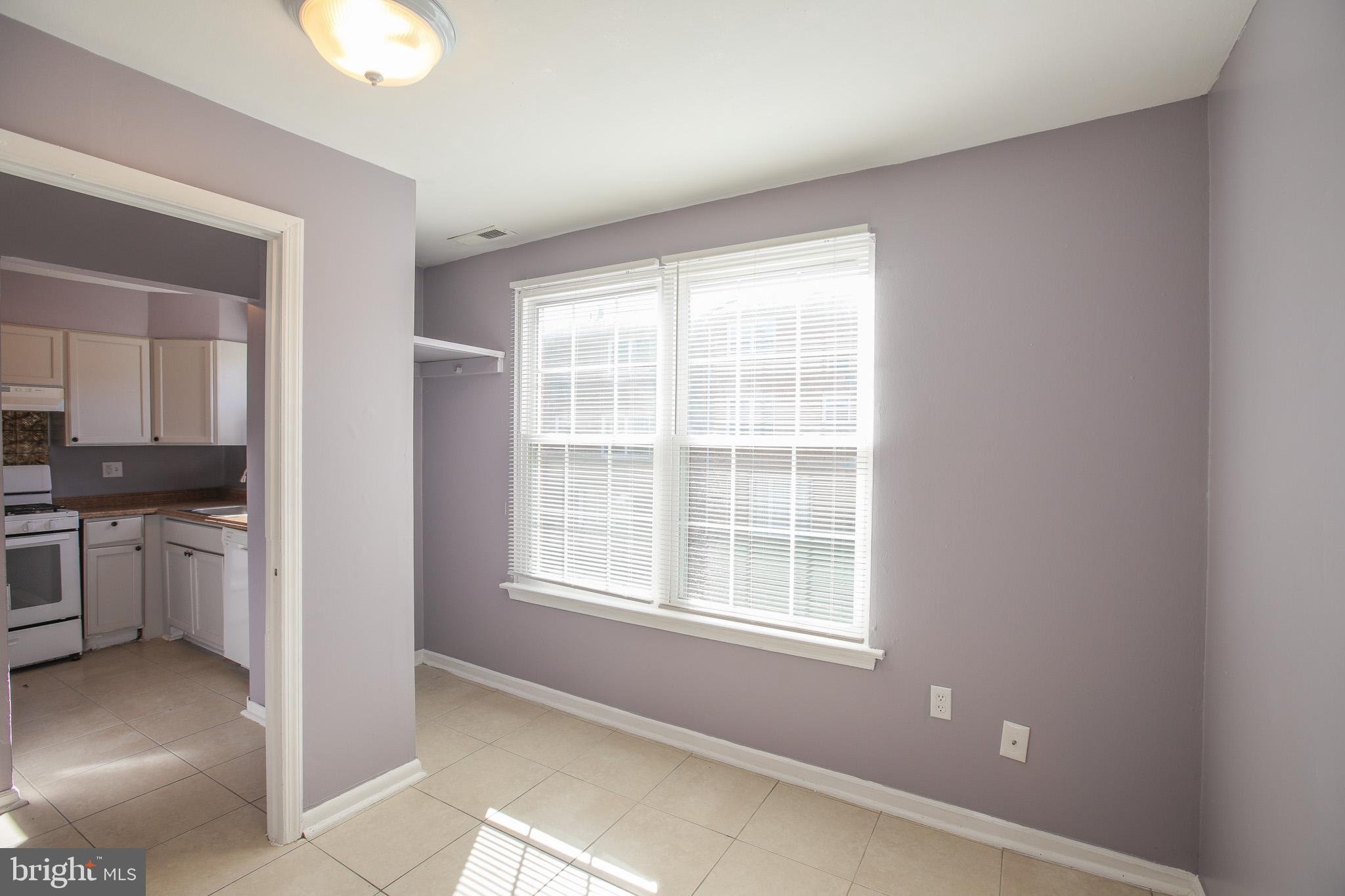 1705 Addison Road South District Heights, MD 20747 - Photo 7 of 26 a view of an empty room with a window