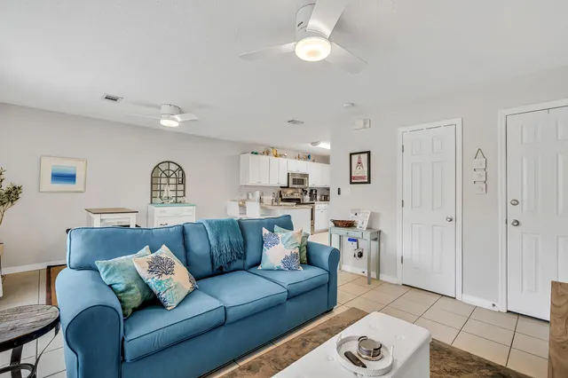 a living room with furniture and a couch