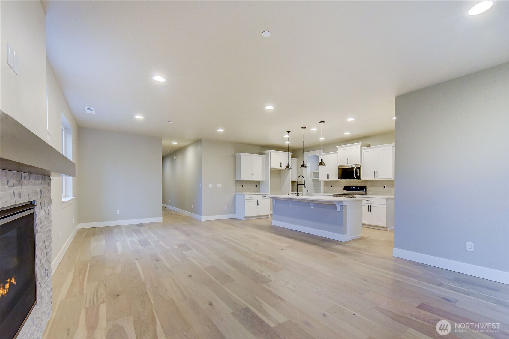 18425 Meridian Avenue Southeast, Unit CR 26 Bothell, WA 98012 - Photo 14 of 35 a view of kitchen with kitchen island wooden floor and center island