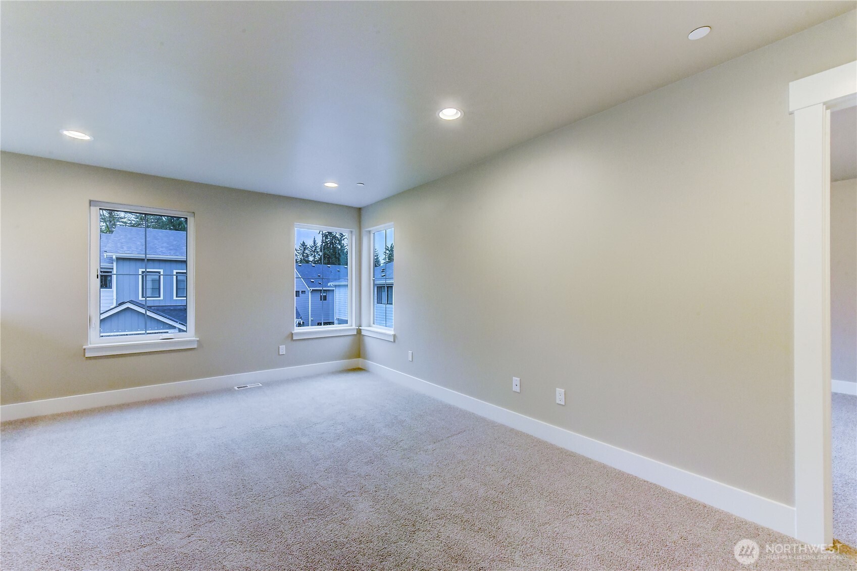 18425 Meridian Avenue Southeast, Unit CR 26 Bothell, WA 98012 - Photo 19 of 35 a view of an empty room with a window and a kitchen