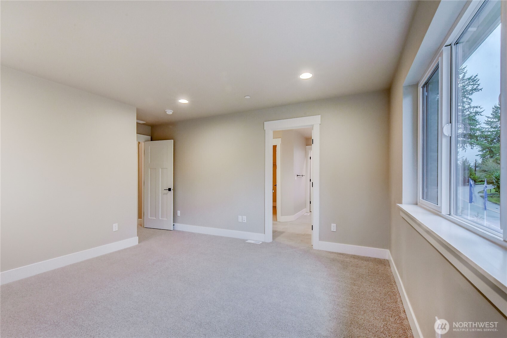 18425 Meridian Avenue Southeast, Unit CR 26 Bothell, WA 98012 - Photo 21 of 35 a view of an empty room and a window