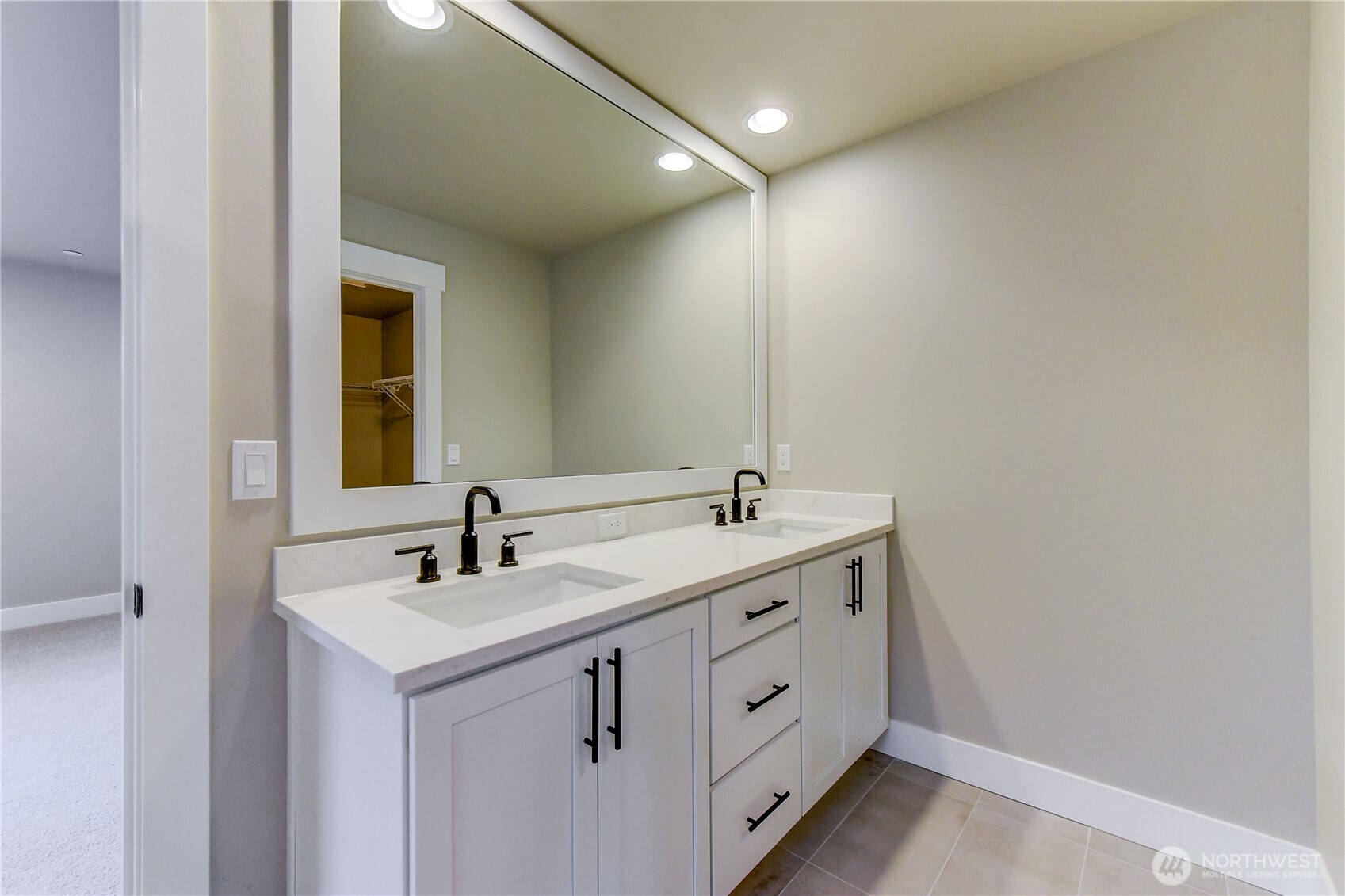 18425 Meridian Avenue Southeast, Unit CR 26 Bothell, WA 98012 - Photo 23 of 35 a bathroom with 2 sink and a mirror