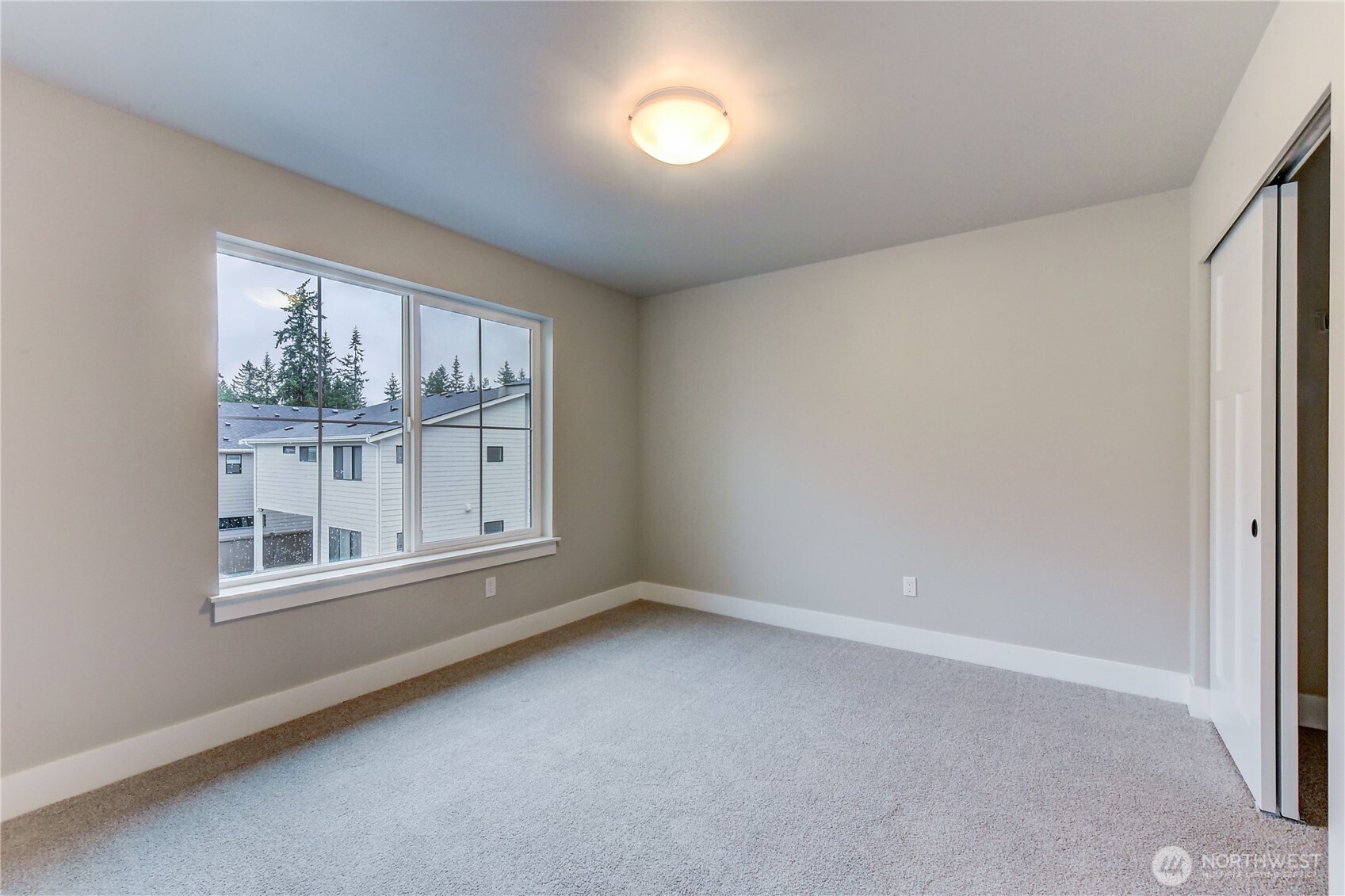18425 Meridian Avenue Southeast, Unit CR 26 Bothell, WA 98012 - Photo 25 of 35 an empty room with a window