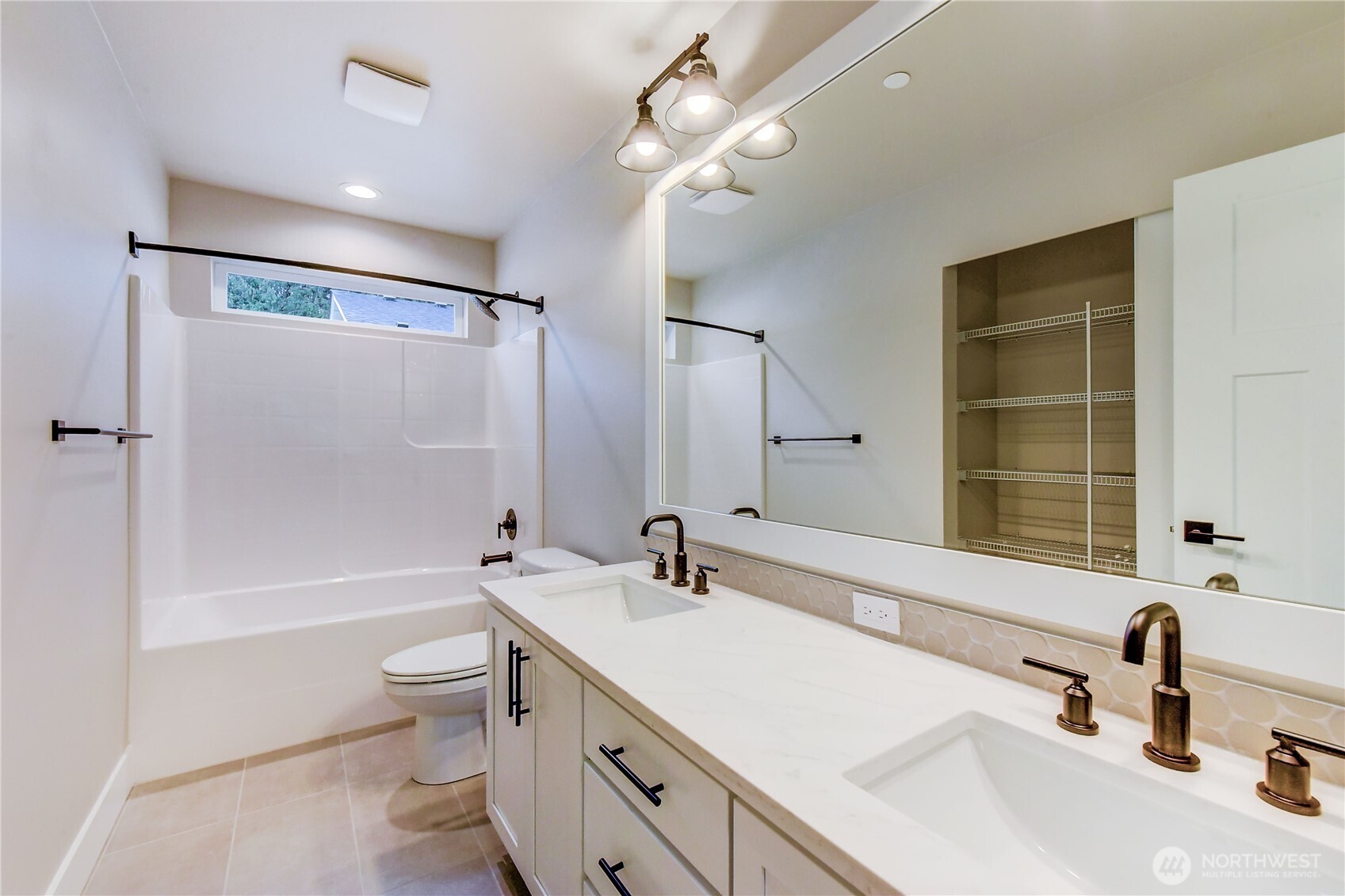 18425 Meridian Avenue Southeast, Unit CR 26 Bothell, WA 98012 - Photo 28 of 35 a bathroom with a double vanity sink a toilet and shower