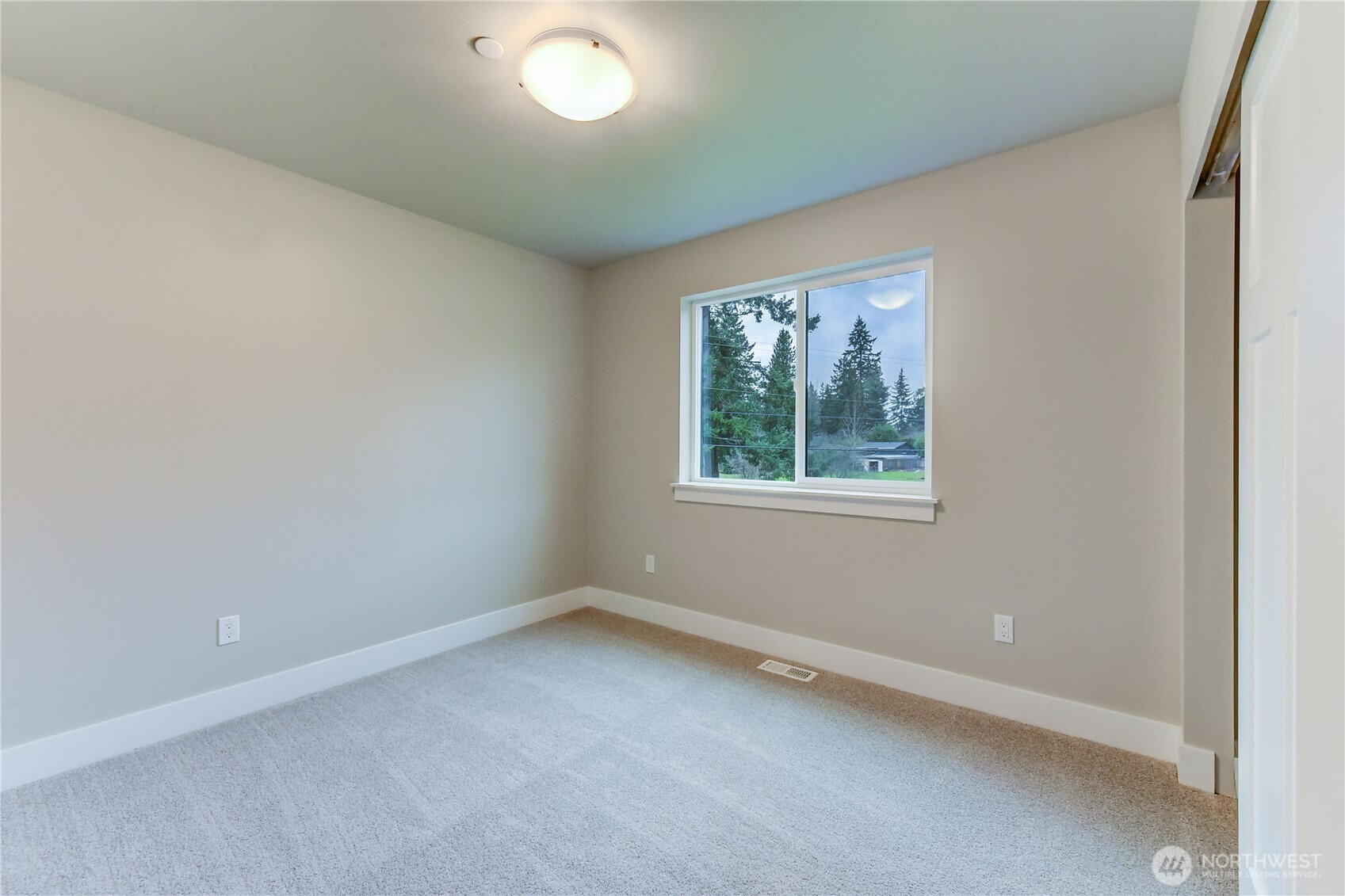 18425 Meridian Avenue Southeast, Unit CR 26 Bothell, WA 98012 - Photo 29 of 35 an empty room with a window