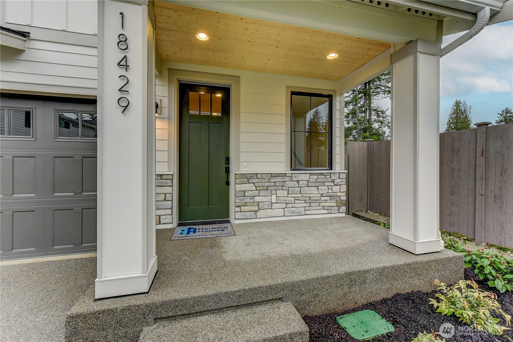 18425 Meridian Avenue Southeast, Unit CR 26 Bothell, WA 98012 - Photo 3 of 35 a view of a house with a outdoor space