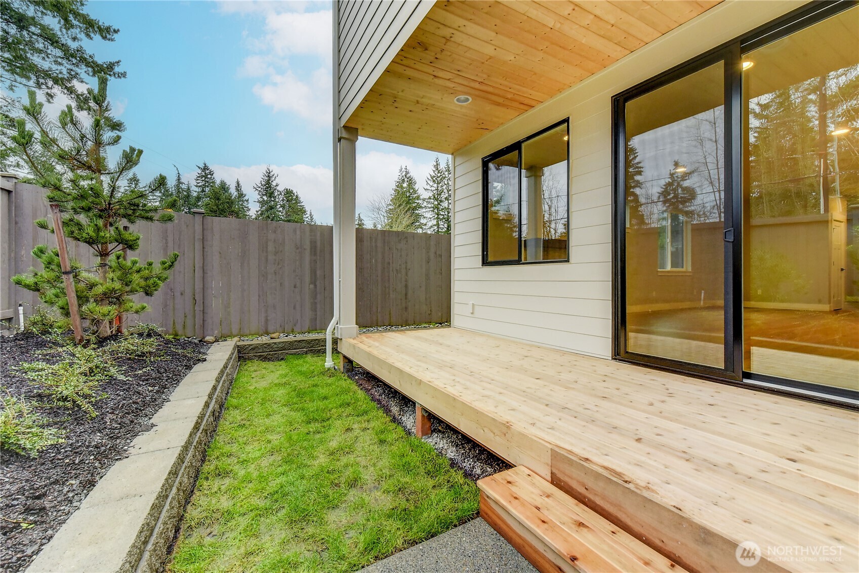 18425 Meridian Avenue Southeast, Unit CR 26 Bothell, WA 98012 - Photo 33 of 35 a front view of a house with garden
