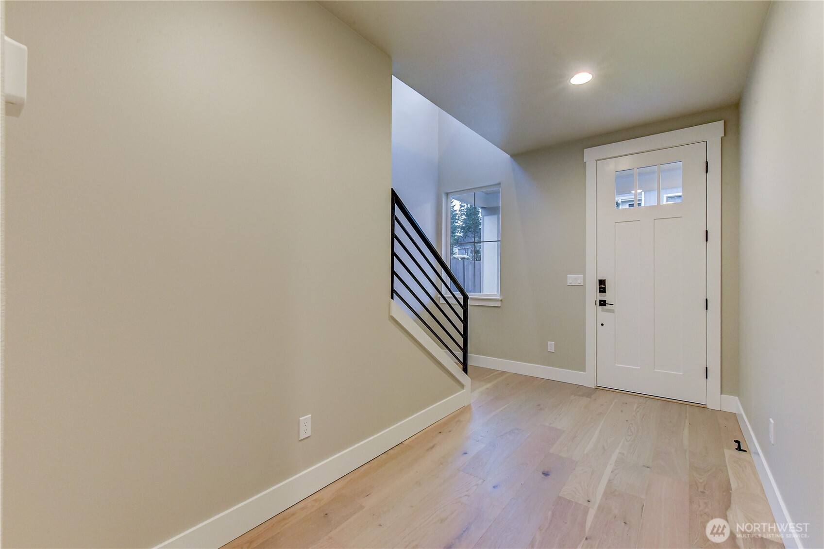 18425 Meridian Avenue Southeast, Unit CR 26 Bothell, WA 98012 - Photo 5 of 35 a view of an entryway with wooden floor