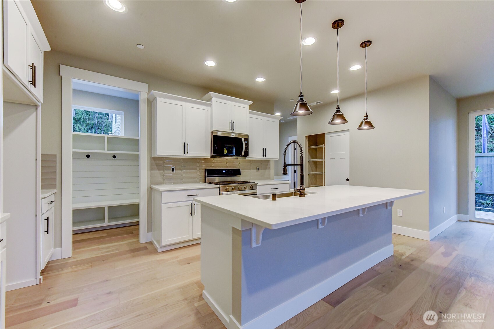 18425 Meridian Avenue Southeast, Unit CR 26 Bothell, WA 98012 - Photo 8 of 35 a view of kitchen with sink microwave and refrigerator