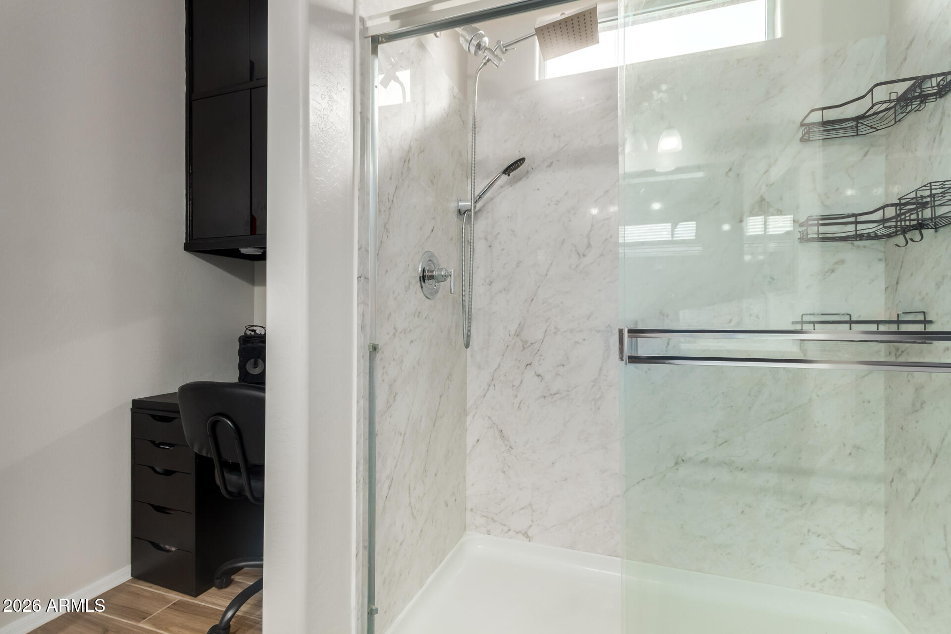 10329 West Gaby Road Tolleson, AZ 85353 - Photo 11 of 22 a bathroom with a shower