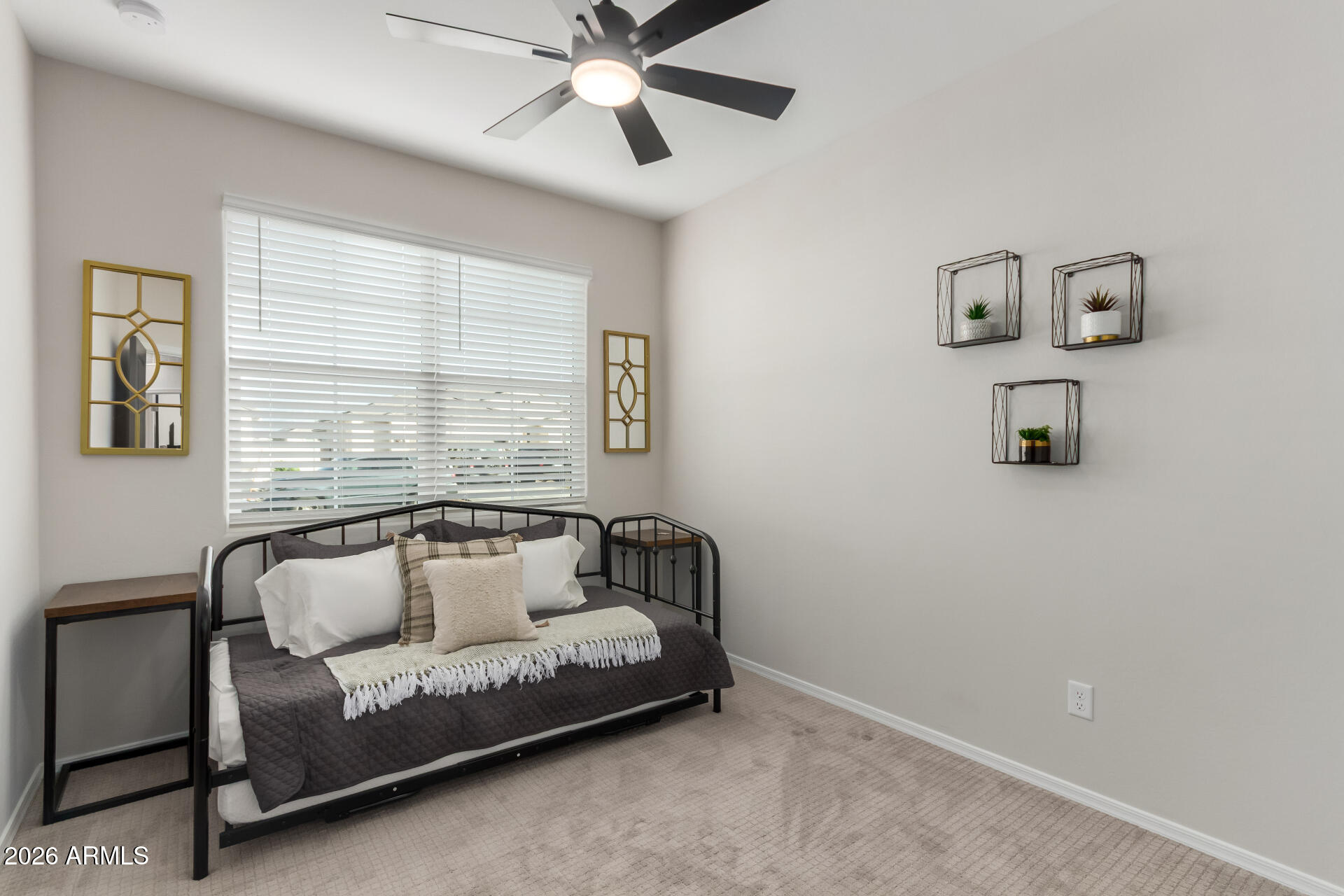 10329 West Gaby Road Tolleson, AZ 85353 - Photo 12 of 22 a living room with furniture and a window