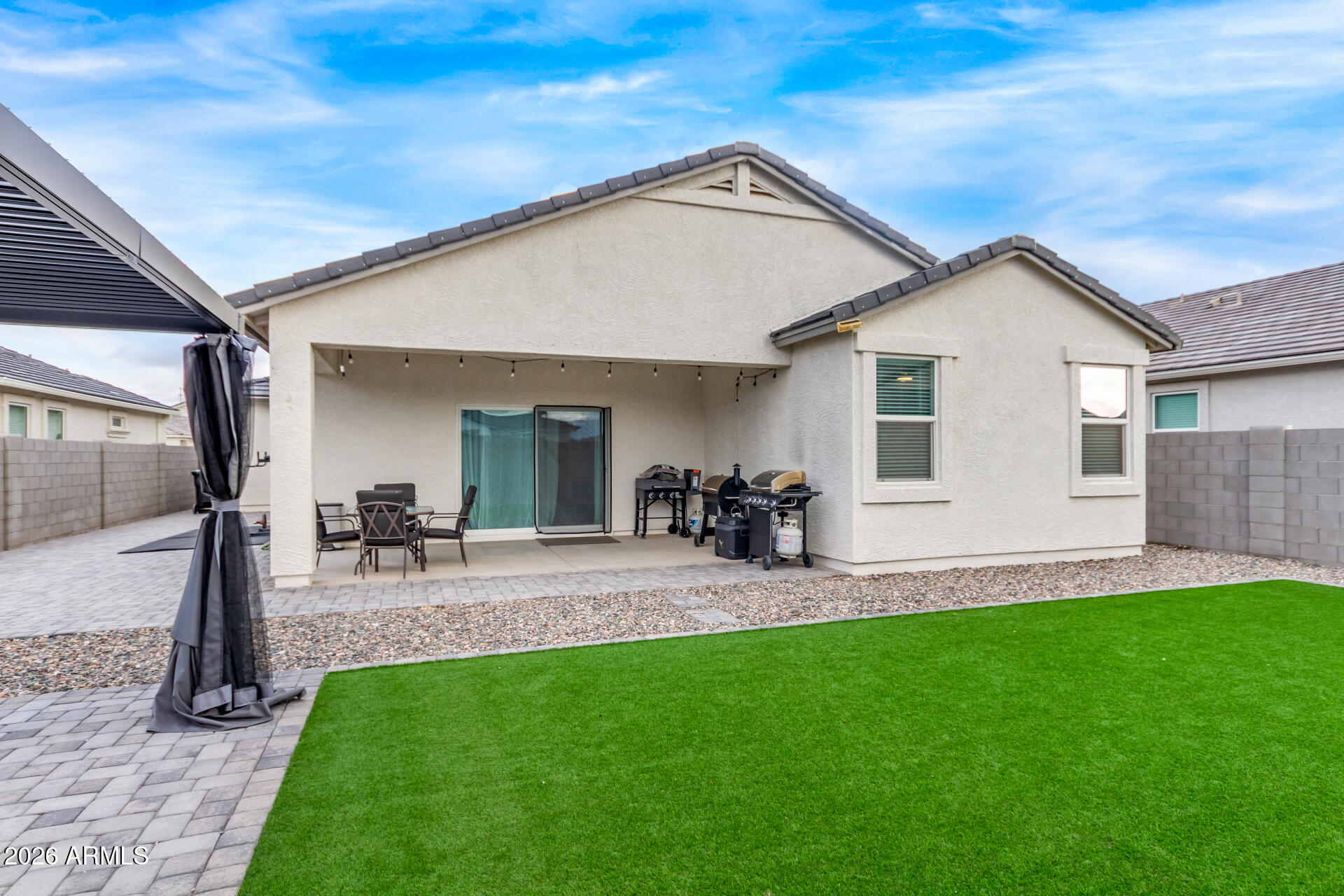 10329 West Gaby Road Tolleson, AZ 85353 - Photo 19 of 22 a view of a backyard with a patio