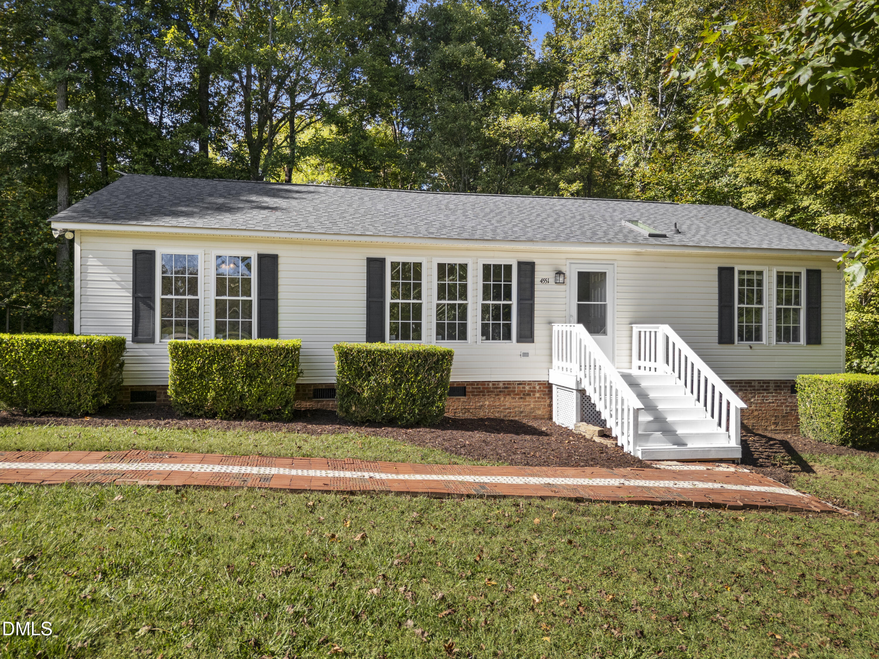 4551 Sugar Maple Road Oxford, NC 27565 - Photo 11 of 23 front view of a house with a patio