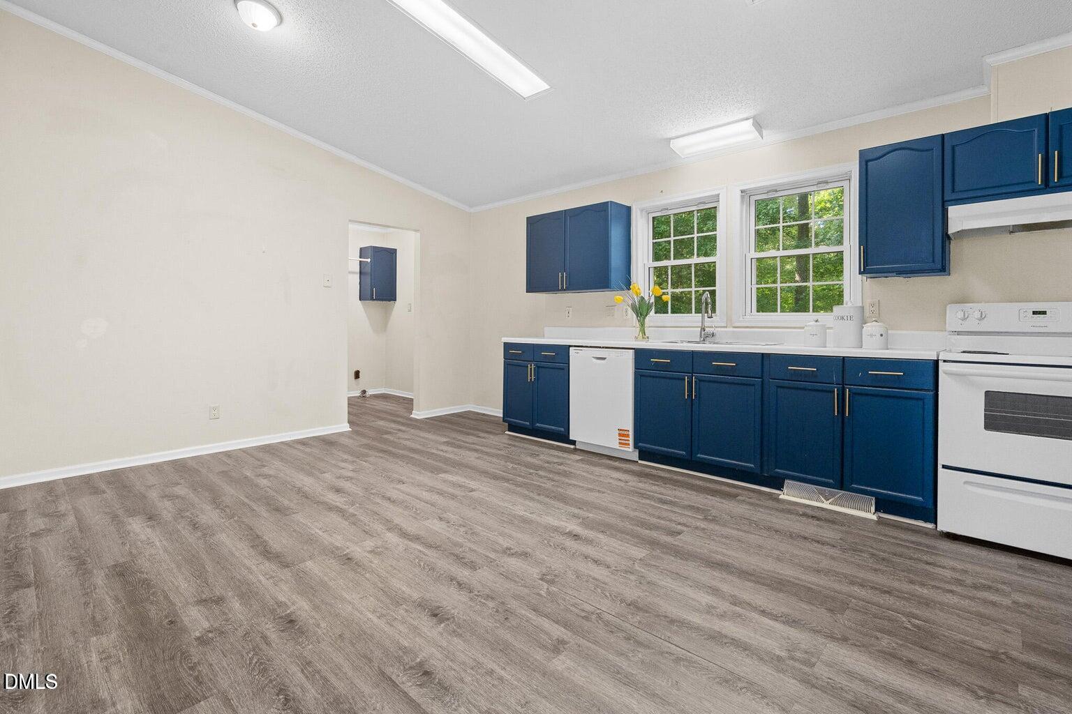 4551 Sugar Maple Road Oxford, NC 27565 - Photo 15 of 23 a view of kitchen with wooden floor and electronic appliances