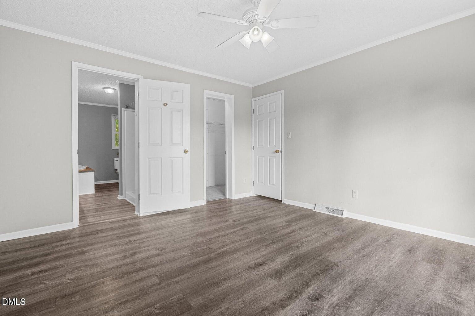 4551 Sugar Maple Road Oxford, NC 27565 - Photo 17 of 23 a view of an empty room with wooden floor