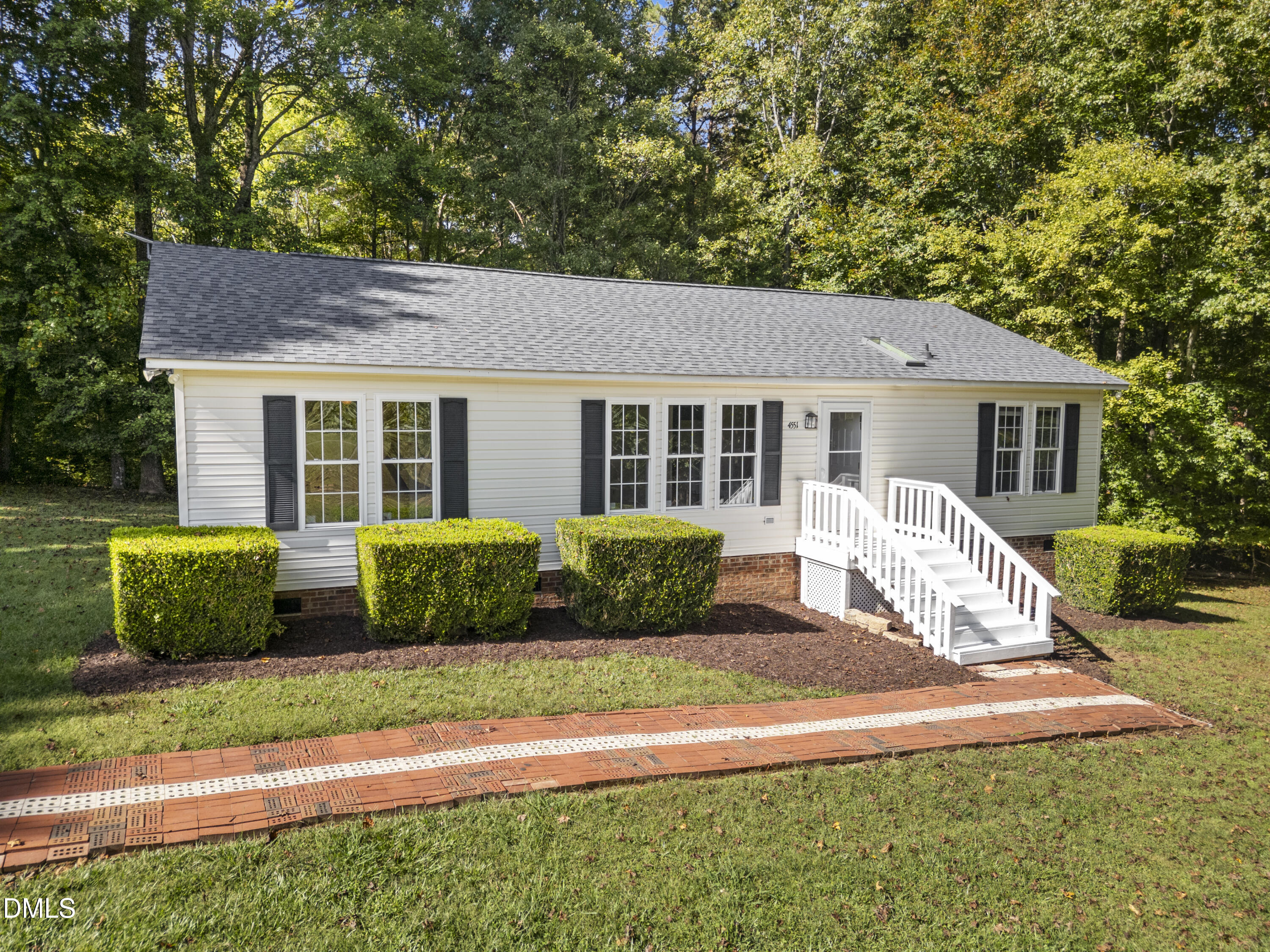 4551 Sugar Maple Road Oxford, NC 27565 - Photo 2 of 23 a front view of a house with a yard