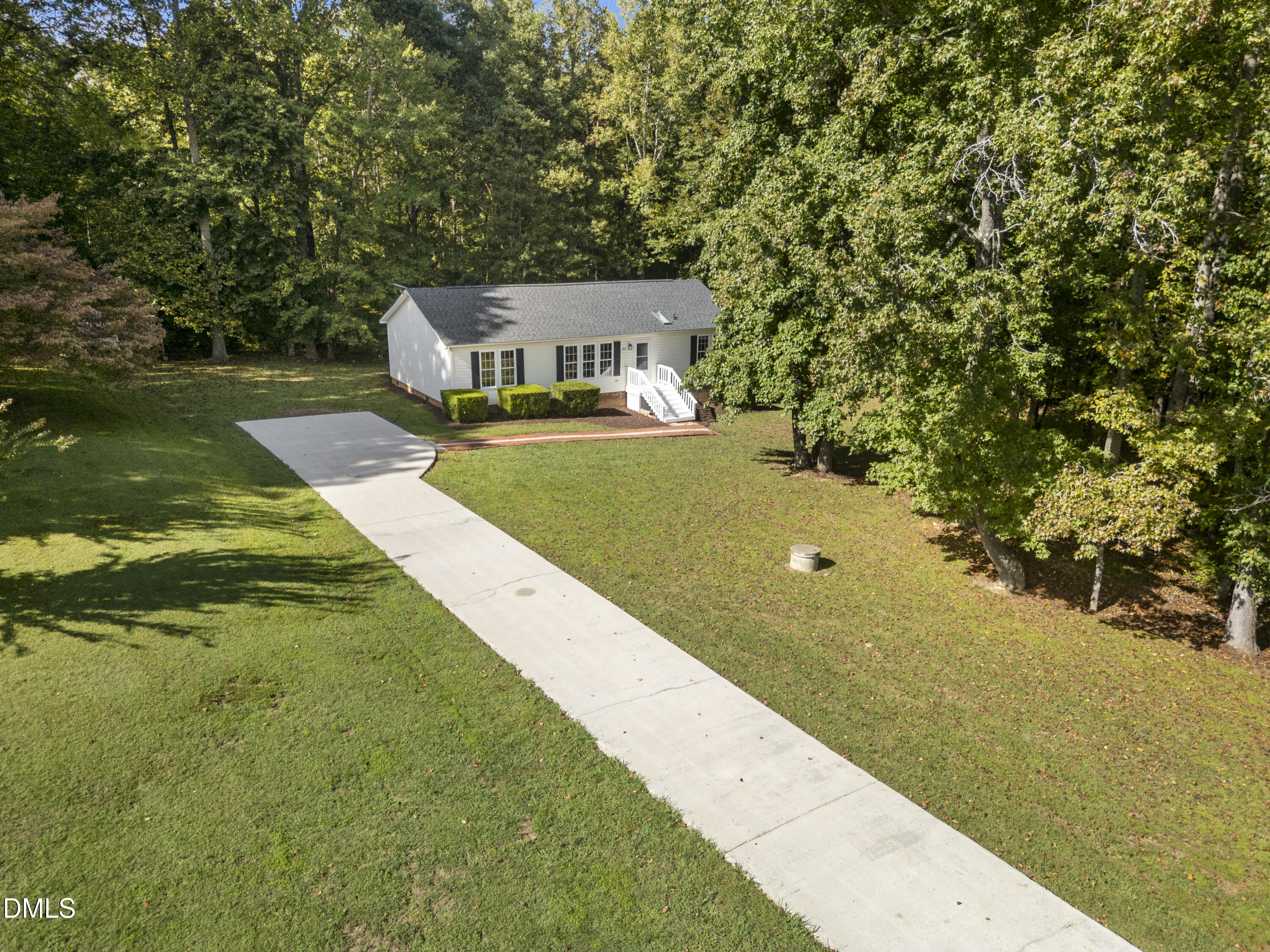 4551 Sugar Maple Road Oxford, NC 27565 - Photo 6 of 23 a view of a yard with a house