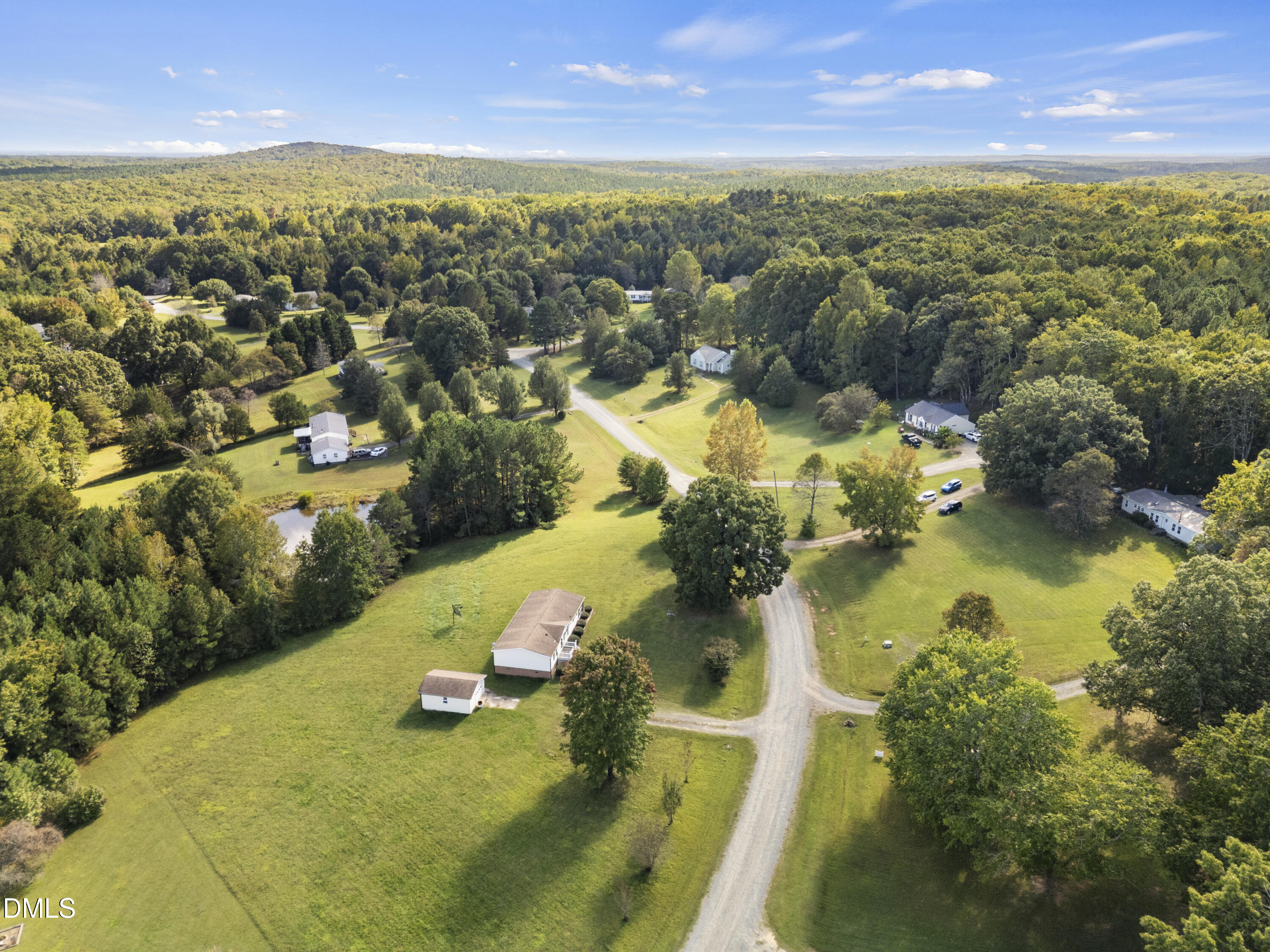 4551 Sugar Maple Road Oxford, NC 27565 - Photo 9 of 23 an aerial view of residential houses with outdoor space