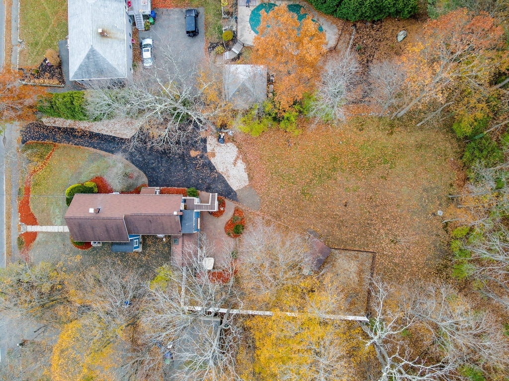 856 Main Street Reading, MA 01867 - Photo 32 of 41 an aerial view of a house with a yard