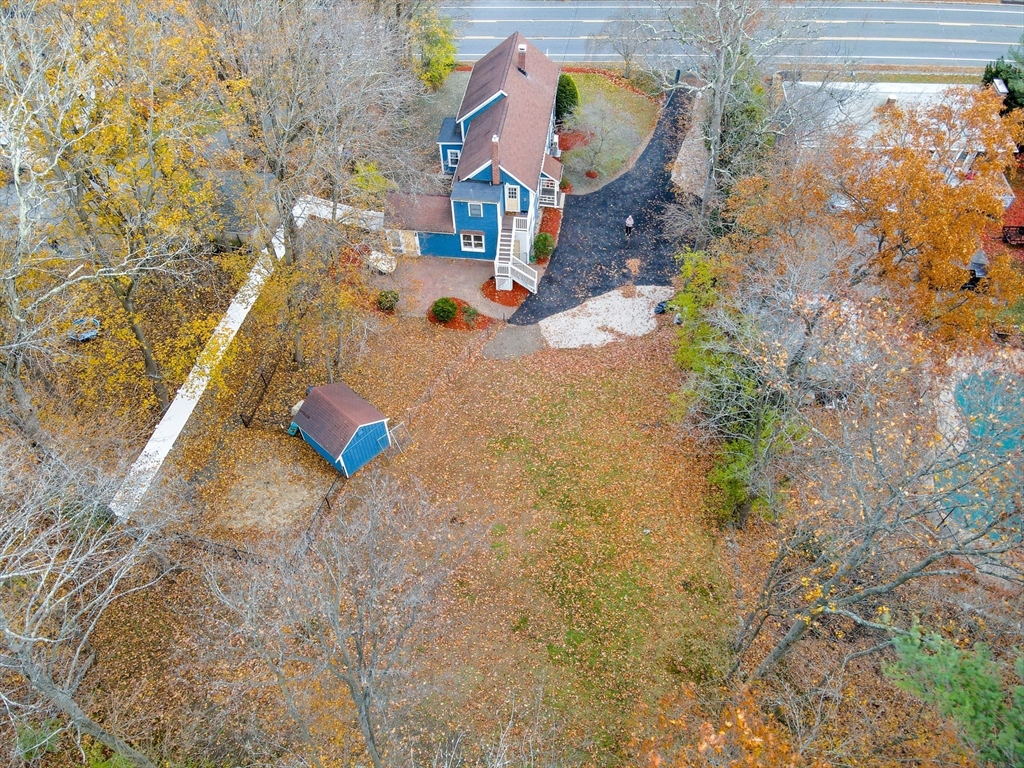 856 Main Street Reading, MA 01867 - Photo 35 of 41 an aerial view of residential houses with outdoor space