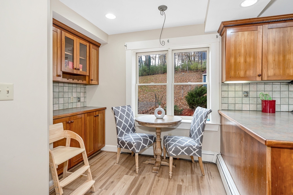 856 Main Street Reading, MA 01867 - Photo 9 of 41 a dining room with furniture and window
