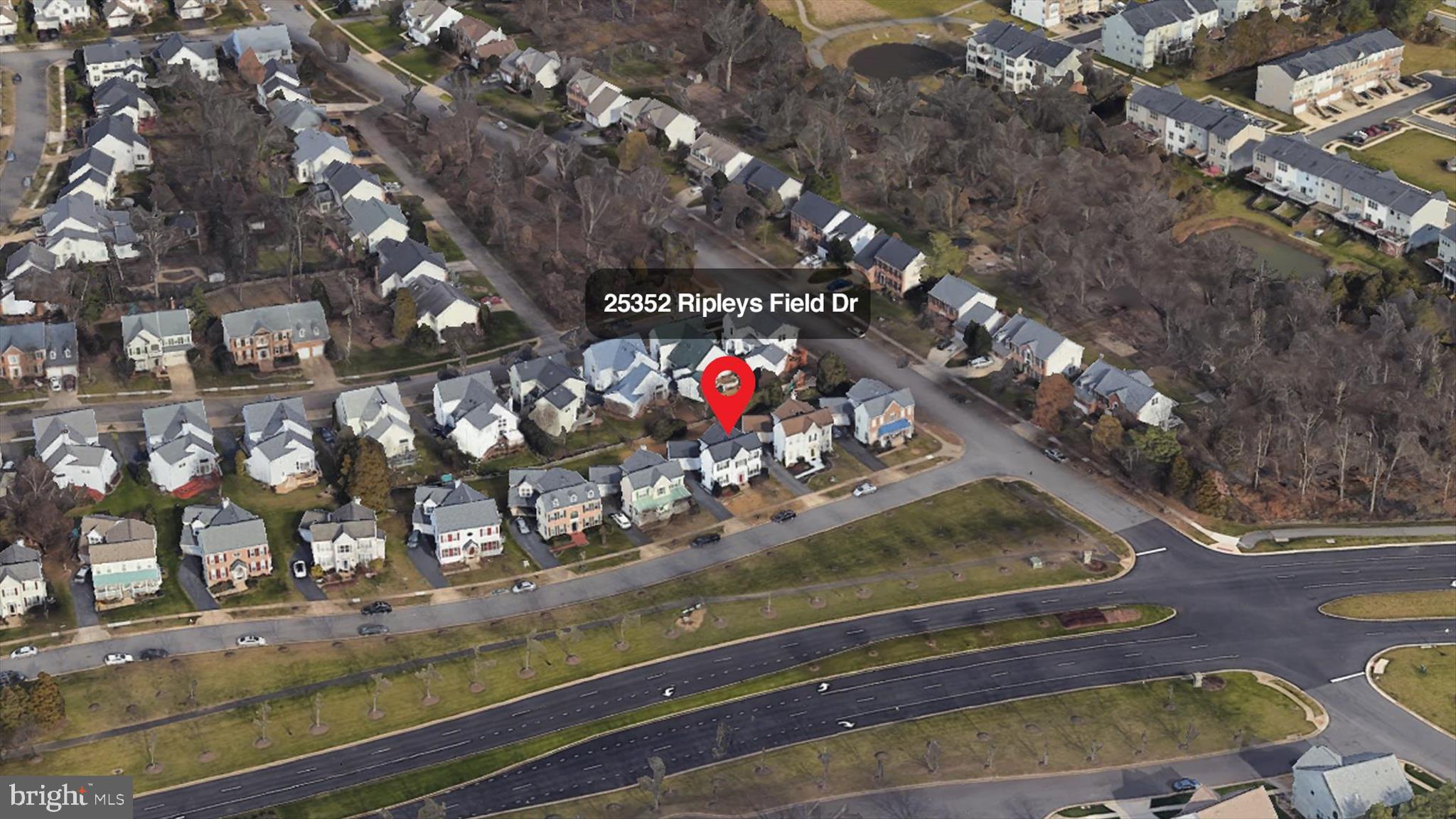 25352 Ripleys Field Drive Chantilly, VA 20152 - Photo 51 of 54 a view of a house with a yard